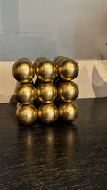 Accesorio decorativo metal acabo negro y dorado